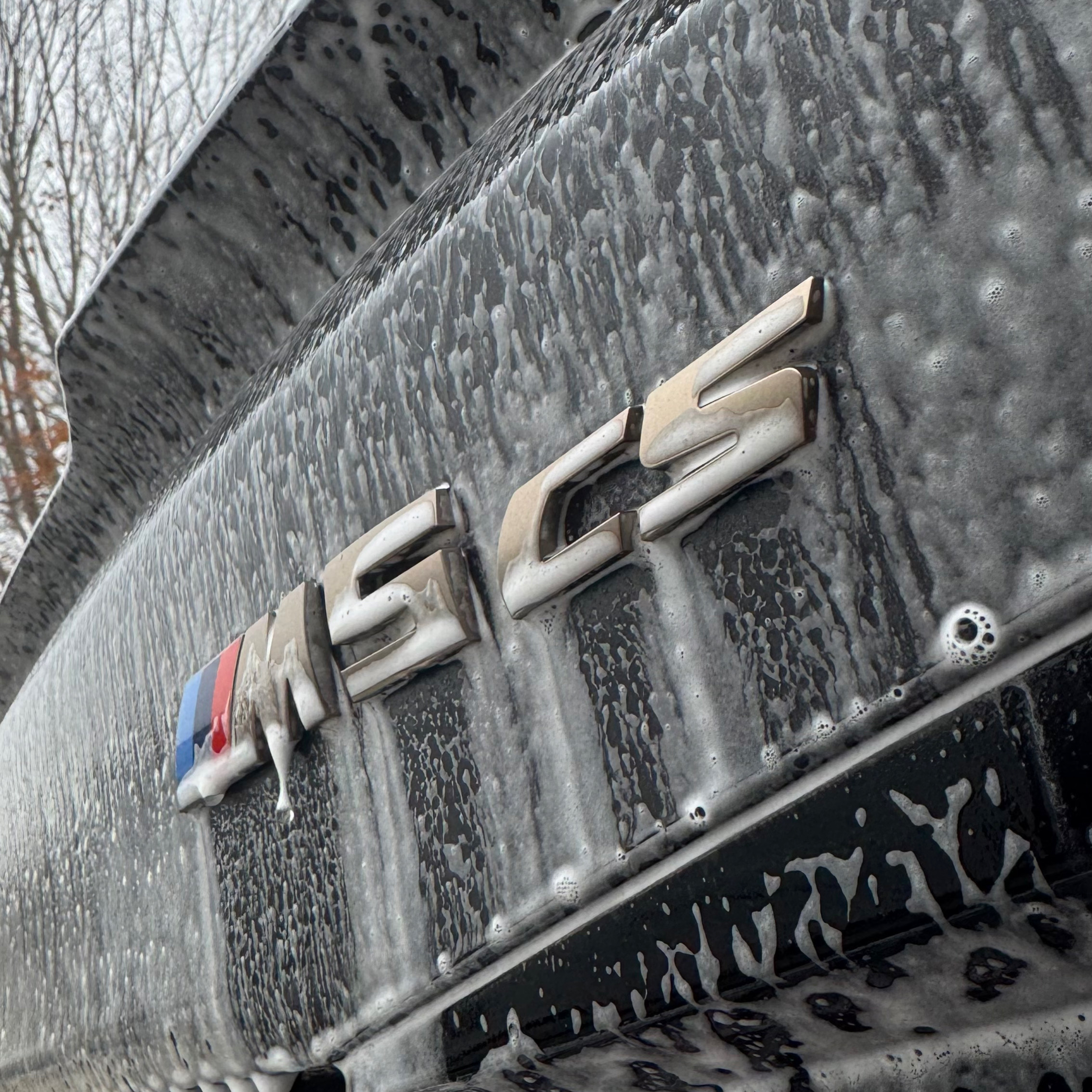 Soapy BMW M5 CS during a mobile wash