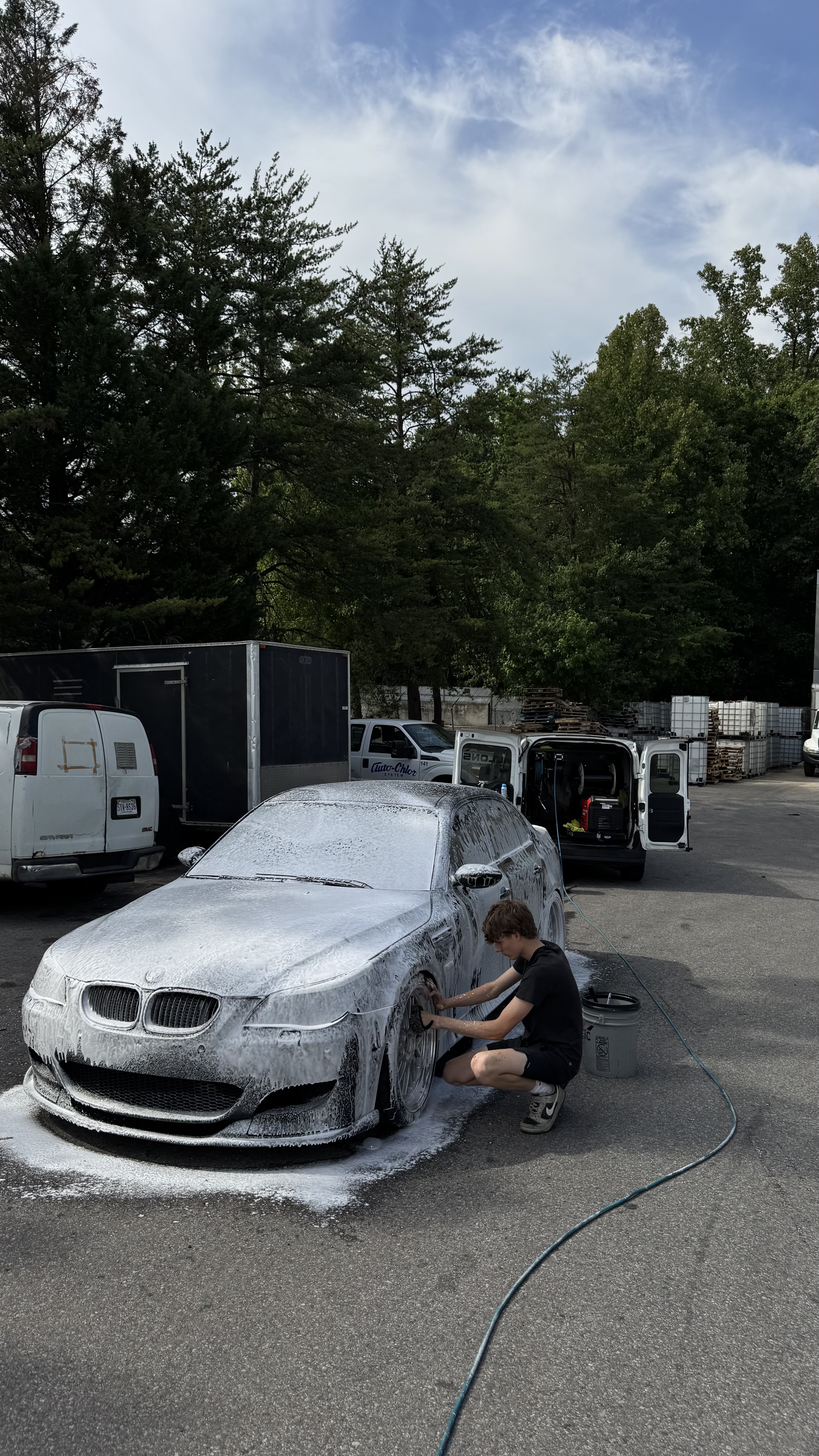 Soapy exterior wash on a BMW